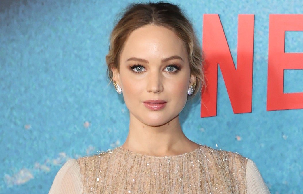 Jennifer Lawrence Debuted Her Shrimp one Bump in a Sparkly Gold Dress With a Sheer Cape