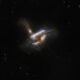 Hubble captures account witness of three galaxies merging into one